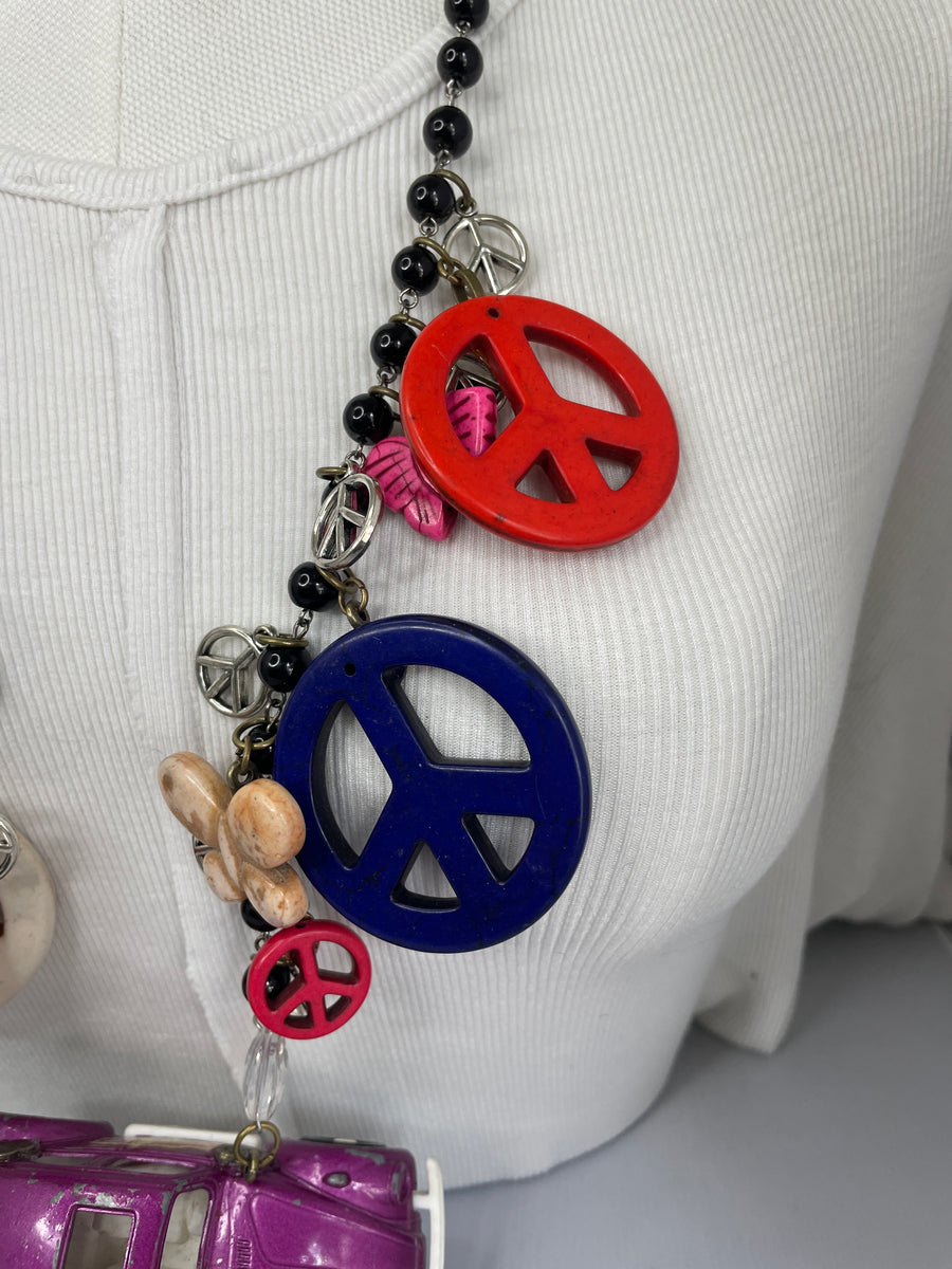 Purple Stingin’ Punch Buggy Necklace by Gina