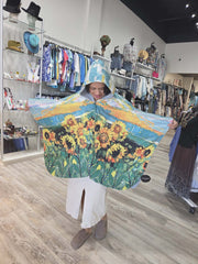 Raincape Poncho in Sunny Days Print by Inoah