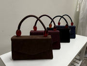 Faux Suede Handbag with lucite Handle Details Robin Boutique
