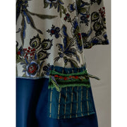 Blue Floral repurposed top into a new tunic size Large. The neckline has snaps to hold in place. The fabric on the bottom is new polyester. - Robin Boutique-Boutique    &.  Reloved Fabrics
